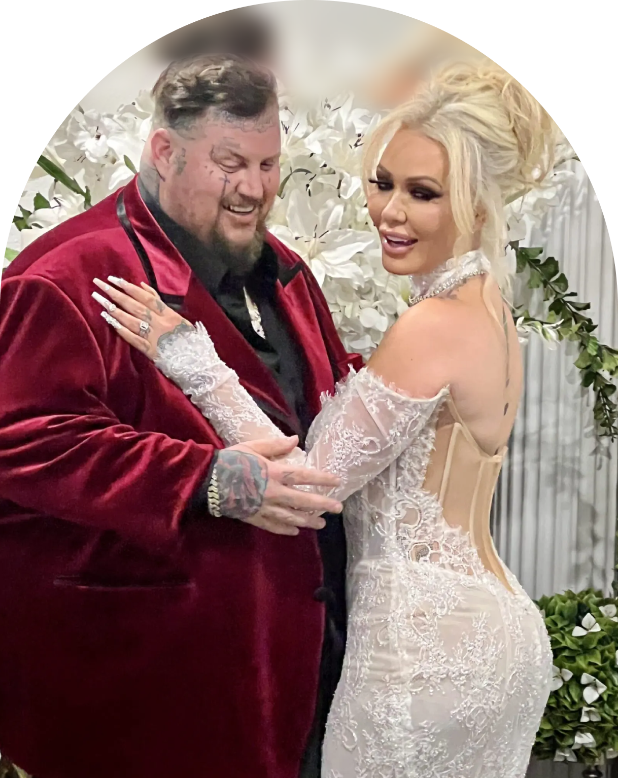 Newlywed couple sharing a joyful moment on their wedding day.